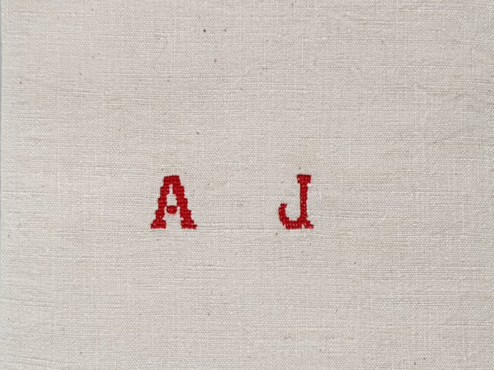 Antique linen hand woven Torchons, or Tea Towels, with red stripes & hand stitched monogram A J
