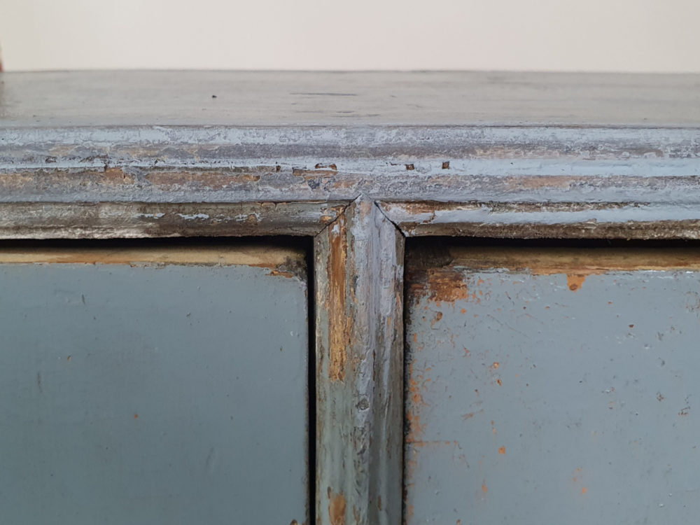 Antique pair of bank of drawers in original blue paint