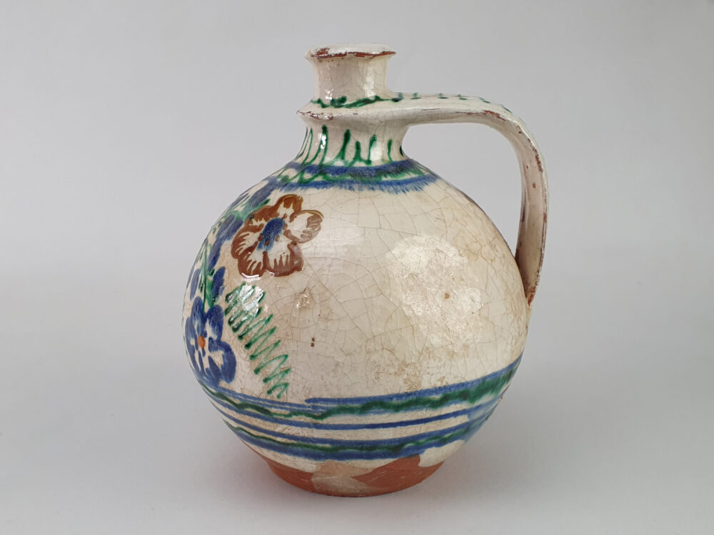 Antique rustic pottery Jug hand with a hand painted Dove