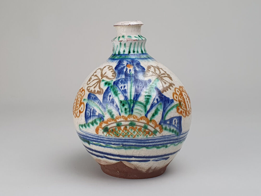 Antique rustic pottery bulbous Jug with hand painted folk art design