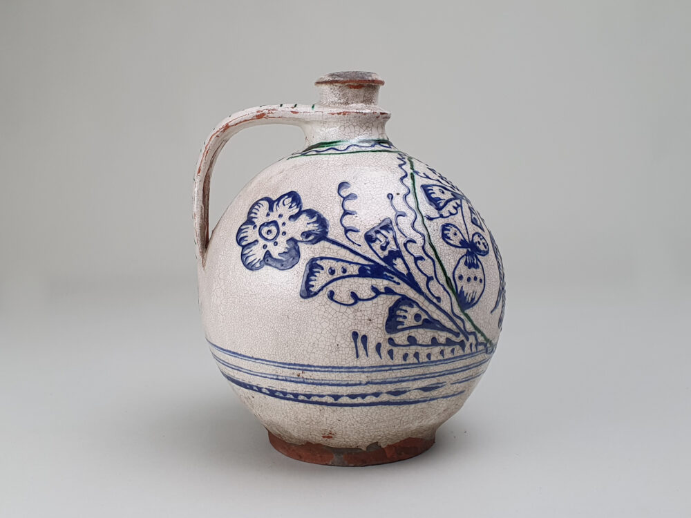 Antique rustic pottery bulbous Jug with hand painted folk art doves