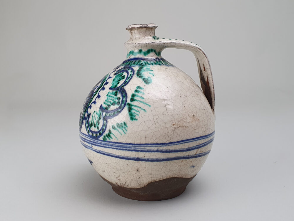 Antique rustic pottery bulbous Jug with hand painted folk art doves