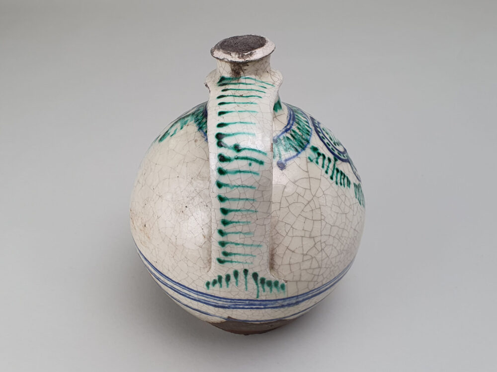 Antique rustic pottery bulbous Jug with hand painted folk art doves