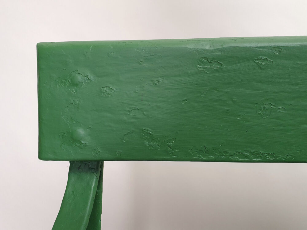 Antique wrought iron Garden Bench with wooden slats and old green paint