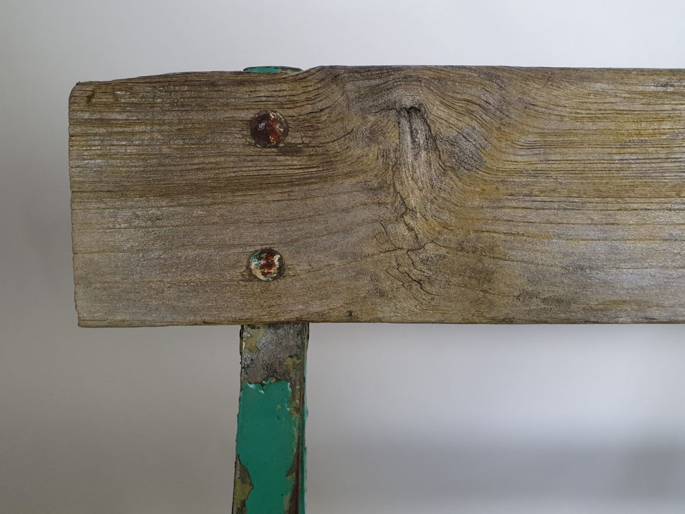 Antique wrought iron Garden Bench with wooden slats and old green paint