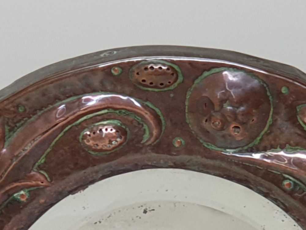 Arts and Crafts repoussé circular copper Mirror