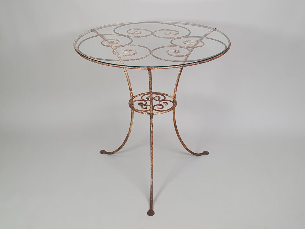 Circular metal antique Table with glass top