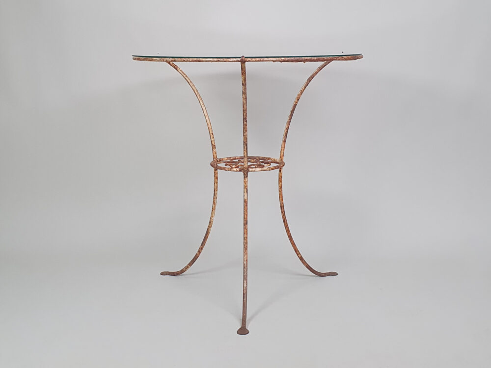 Circular metal antique Table with glass top