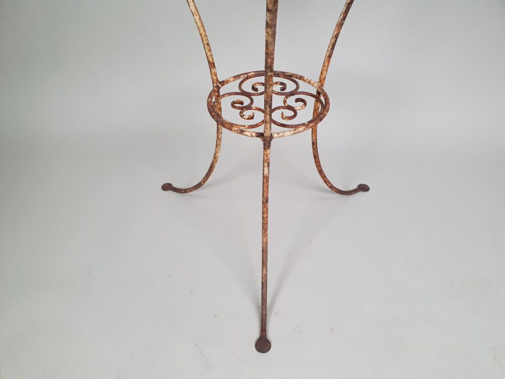 Circular metal antique Table with glass top