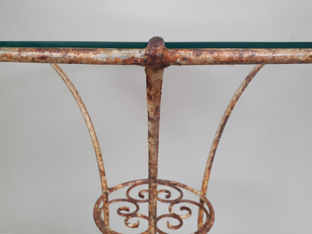 Circular metal antique Table with glass top