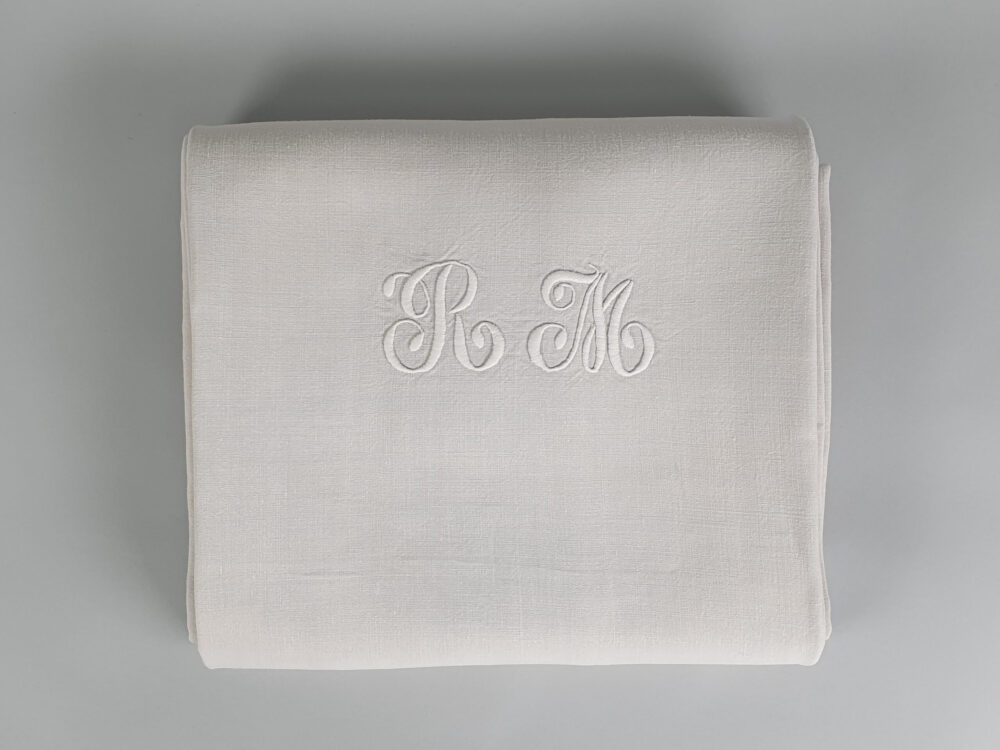 Cream antique linen French Sheet with monogram R M