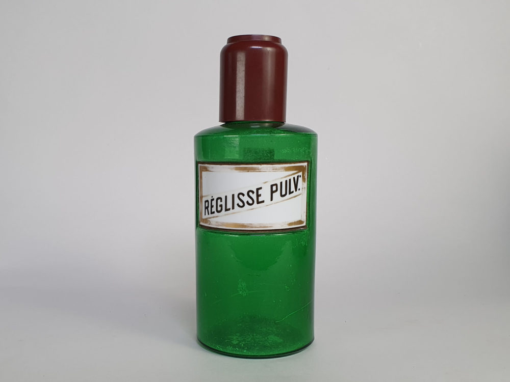 Decorative antique green French Pharmacy Bottles with porcelain labels