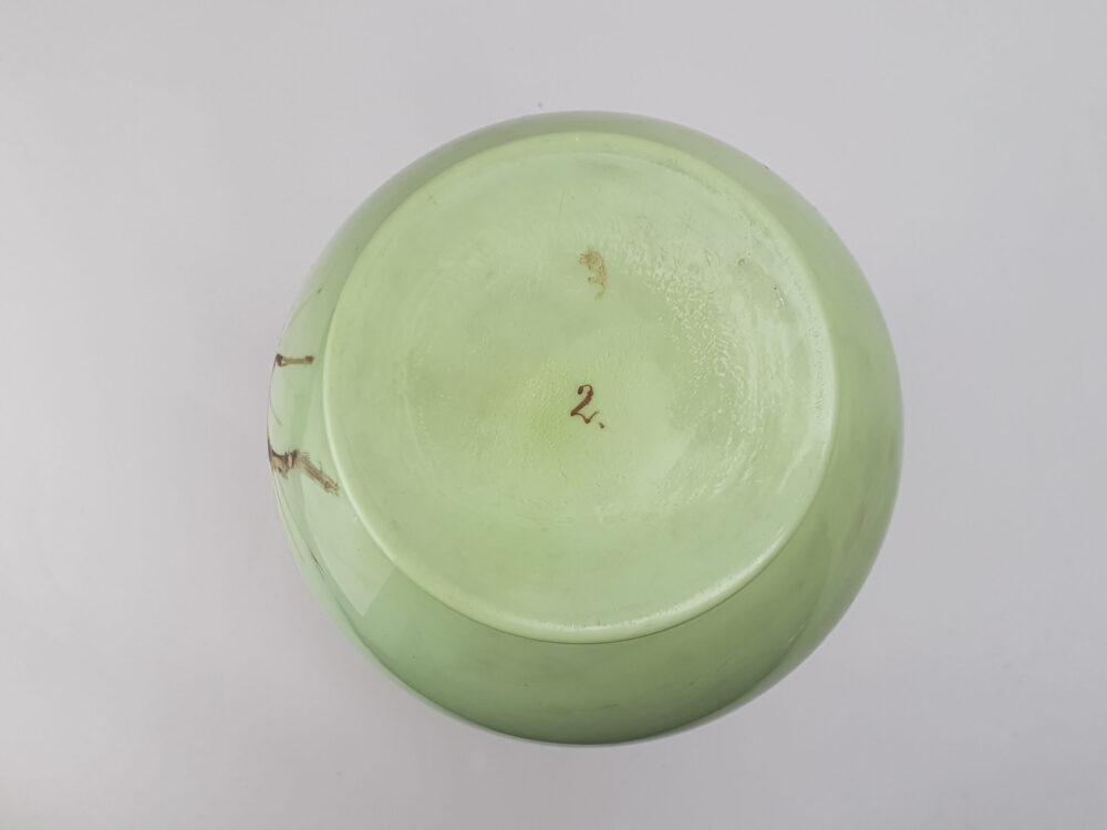 Edwardian decorative antique green opaque glass Vase with a hand painted bird design
