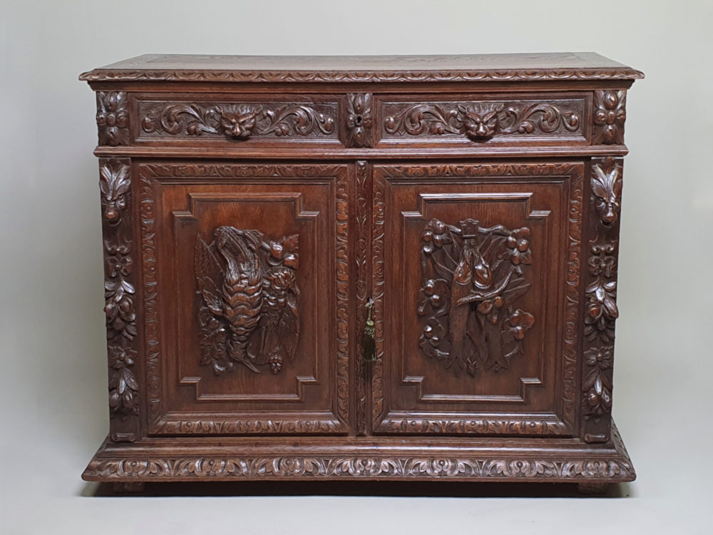 French antique oak Sideboard or Buffet with ornate bird, fish and lion carvings
