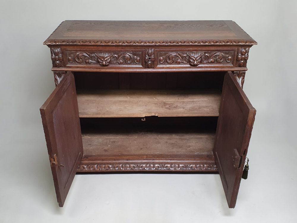 French antique oak Sideboard or Buffet with ornate bird, fish and lion carvings