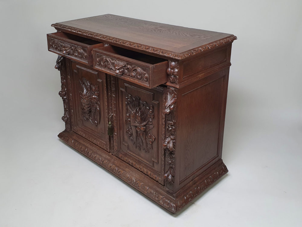 French antique oak Sideboard or Buffet with ornate bird, fish and lion carvings