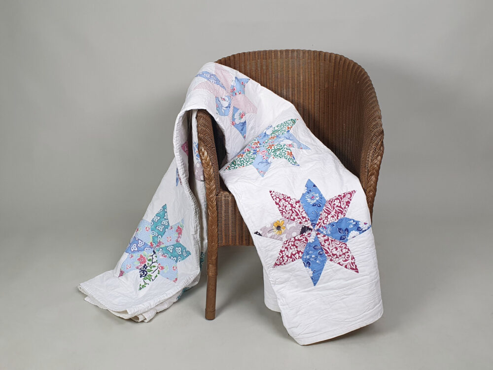 Handstitched patchwork antique Quilt with floral star designs