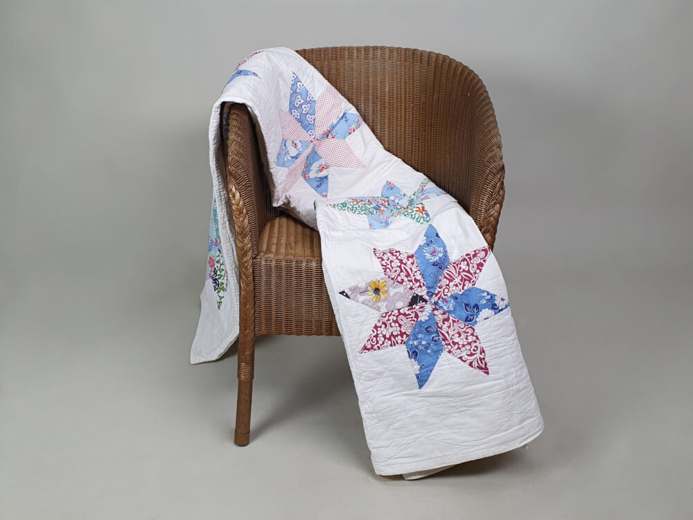Handstitched patchwork antique Quilt with floral star designs