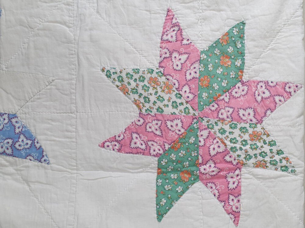 Handstitched patchwork antique Quilt with floral star designs