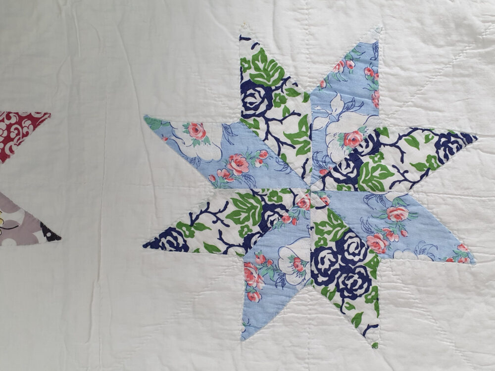 Handstitched patchwork antique Quilt with floral star designs