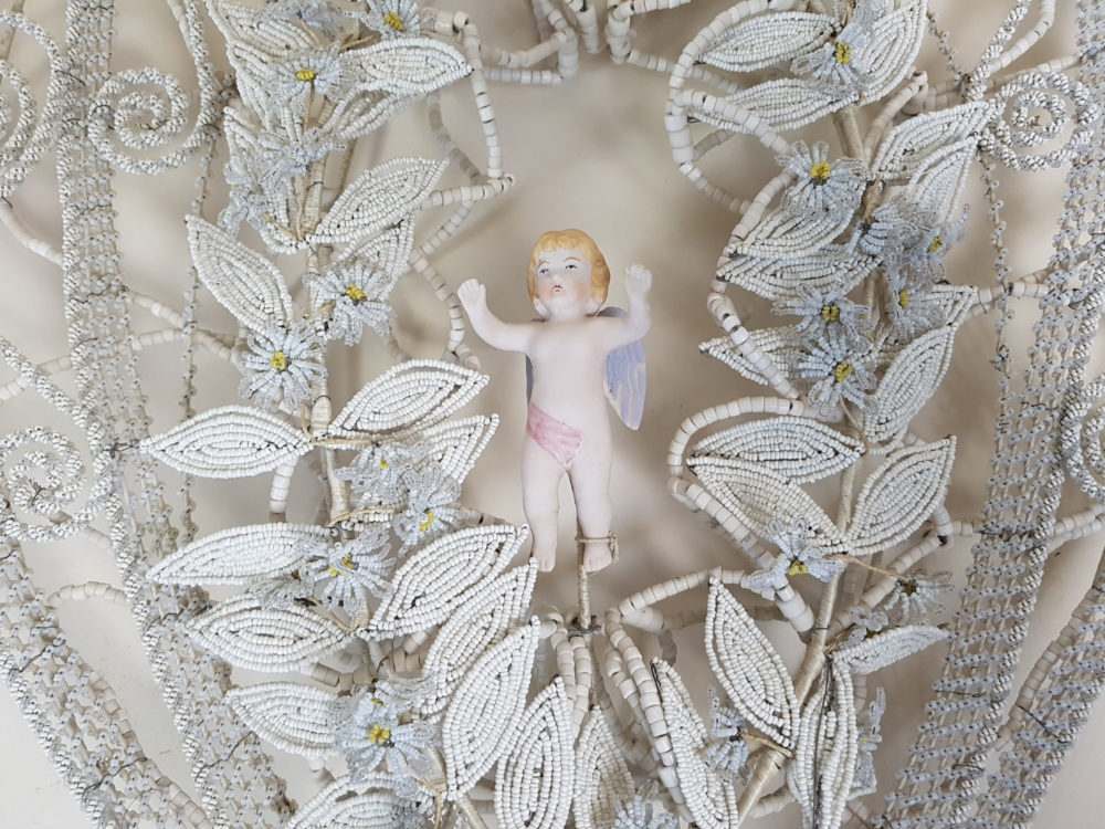 Heart shaped antique Bead Work Wreath with Cherub
