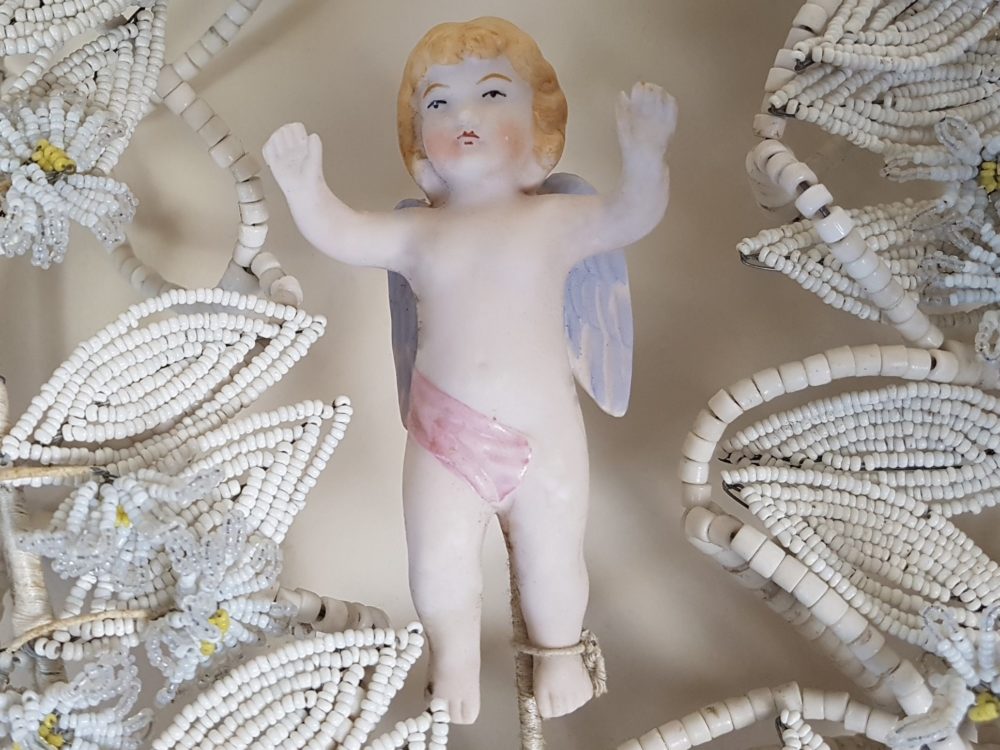 Heart shaped antique Bead Work Wreath with Cherub