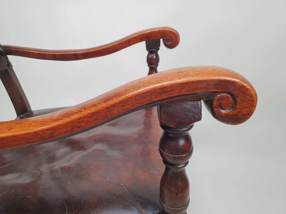 Oak and leather open arm early 1900s antique Chair