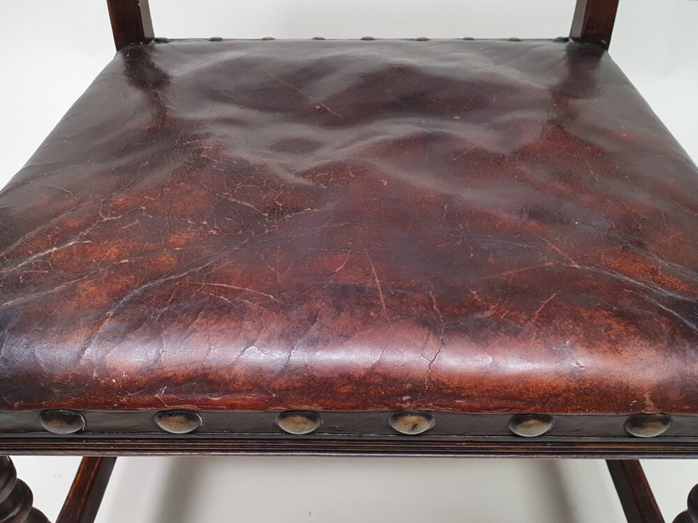 Oak and leather open arm early 1900s antique Chair