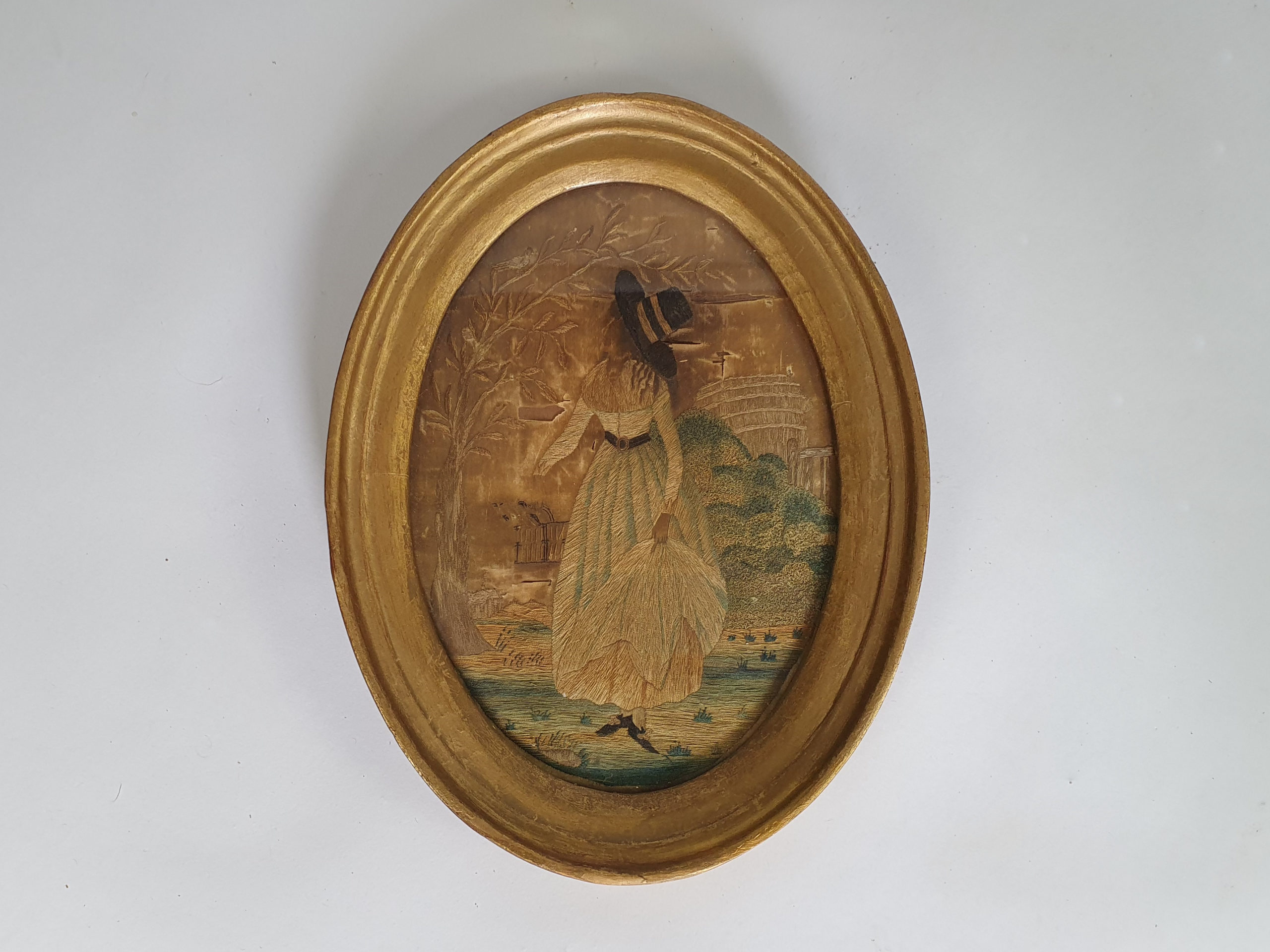 Pair of 19th century antique Georgian Silk Work Ladies in oval frames