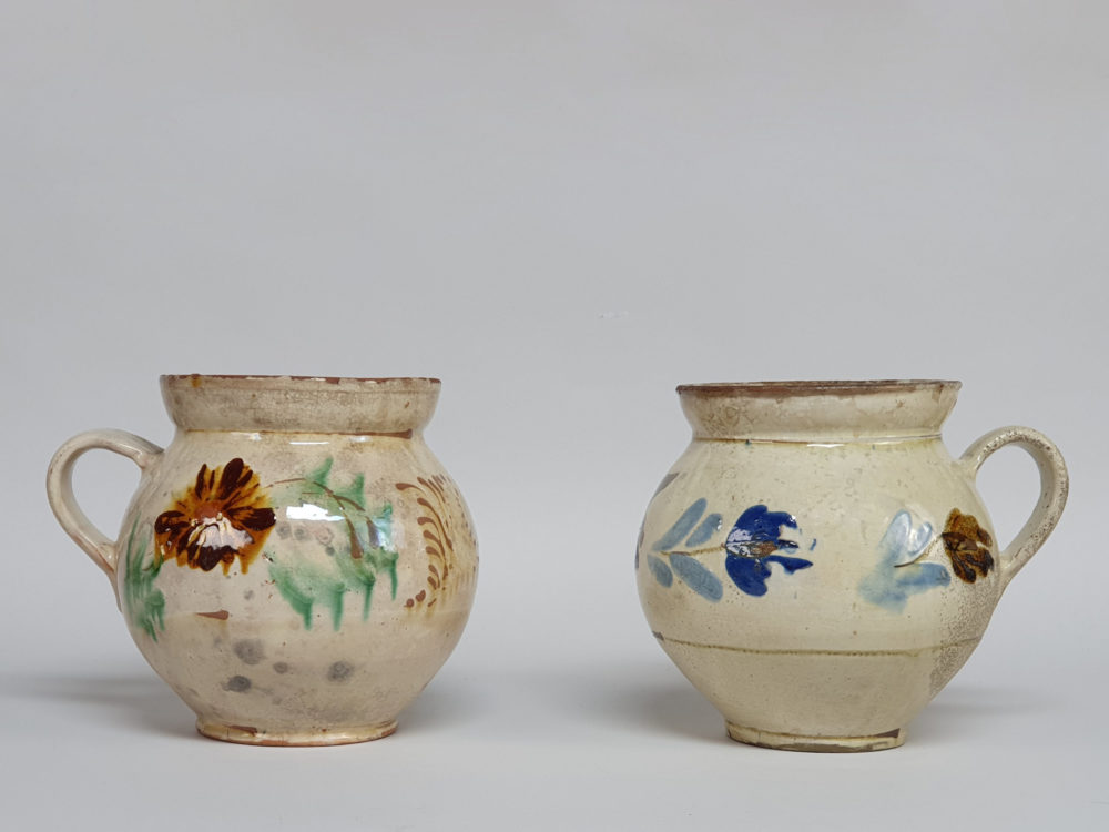 Pair of 19th century rustic floral pottery Jugs