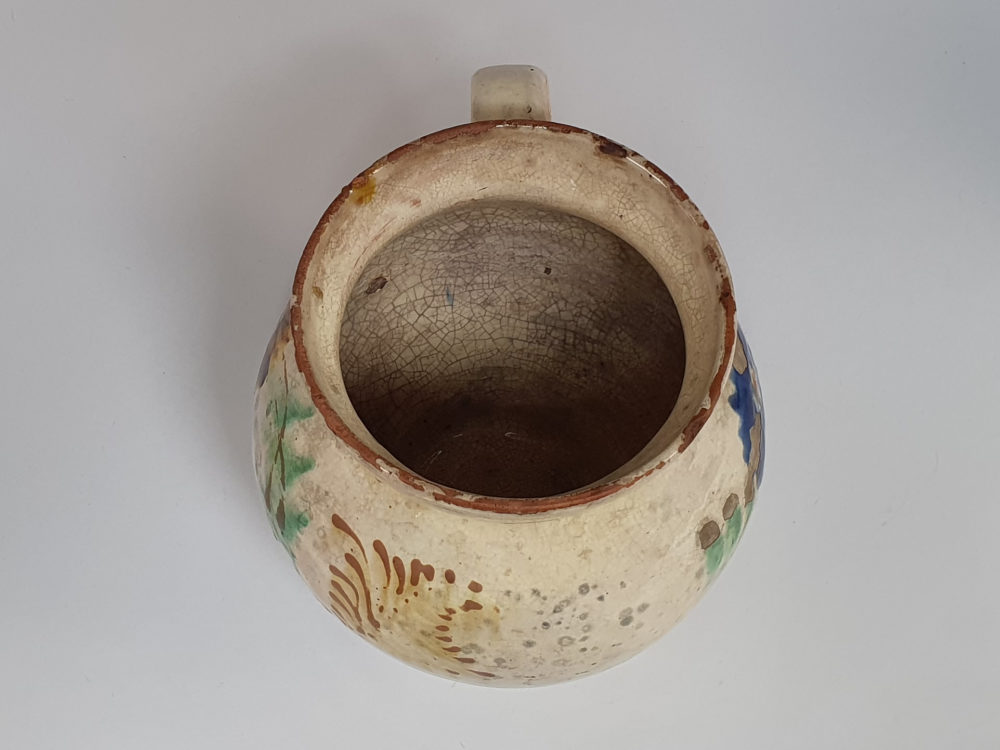 Pair of 19th century rustic floral pottery Jugs