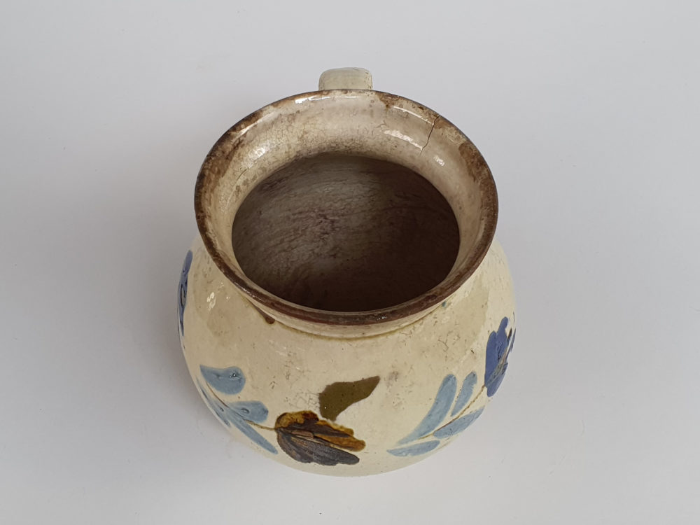 Pair of 19th century rustic floral pottery Jugs