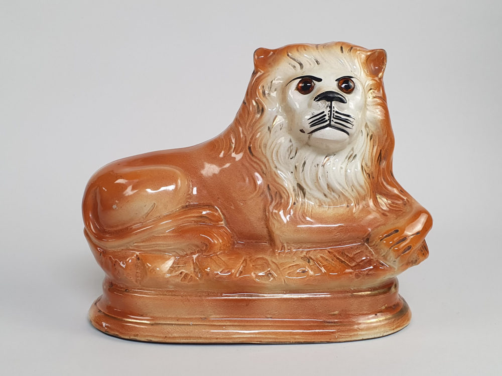 Pair of antique Victorian Bo'ness Staffordshire style hand painted pottery Lions