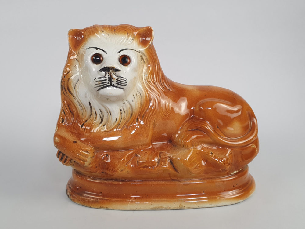 Pair of antique Victorian Bo'ness Staffordshire style hand painted pottery Lions