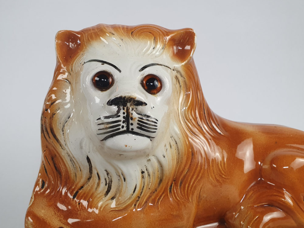 Pair of antique Victorian Bo'ness Staffordshire style hand painted pottery Lions