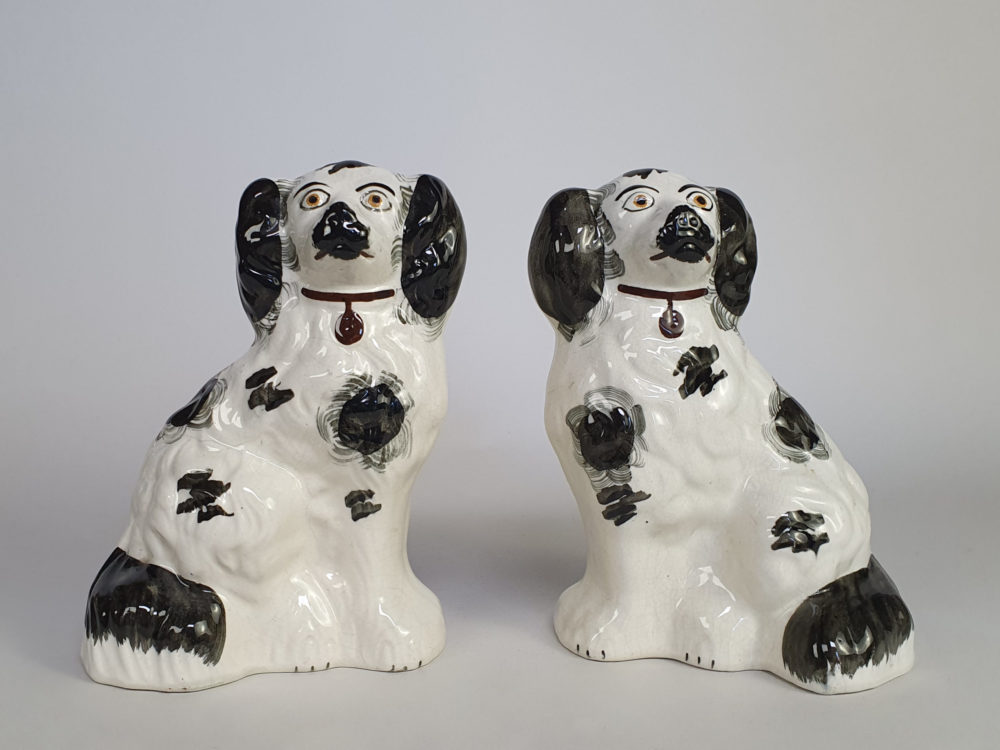A pair of antique Victorian Staffordshire pottery Spaniel Dogs