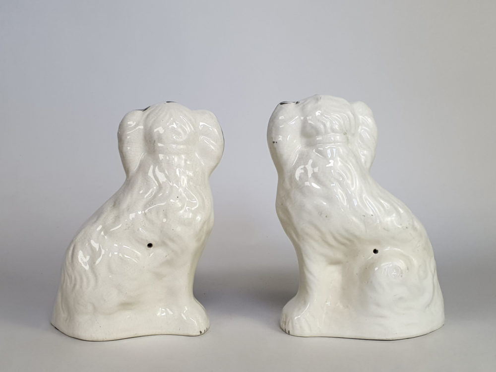 A pair of antique Victorian Staffordshire pottery Spaniel Dogs