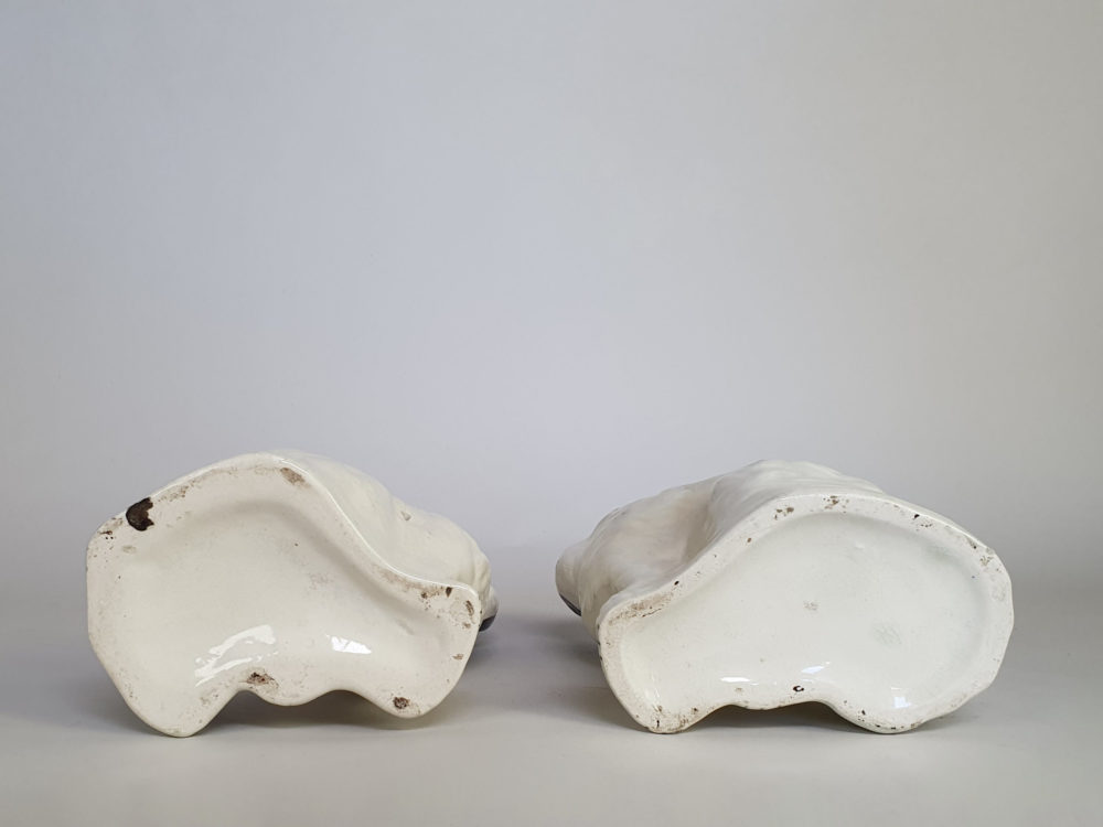 A pair of antique Victorian Staffordshire pottery Spaniel Dogs