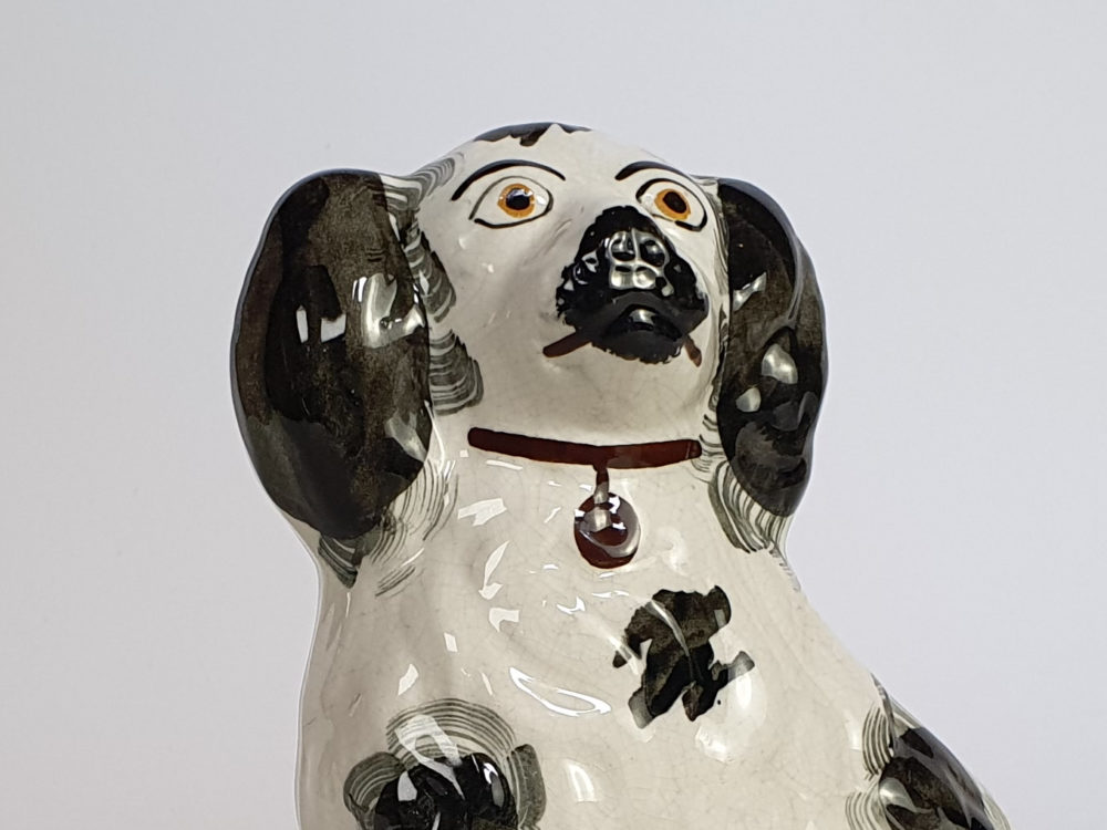 A pair of antique Victorian Staffordshire pottery Spaniel Dogs