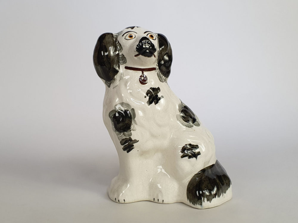 A pair of antique Victorian Staffordshire pottery Spaniel Dogs