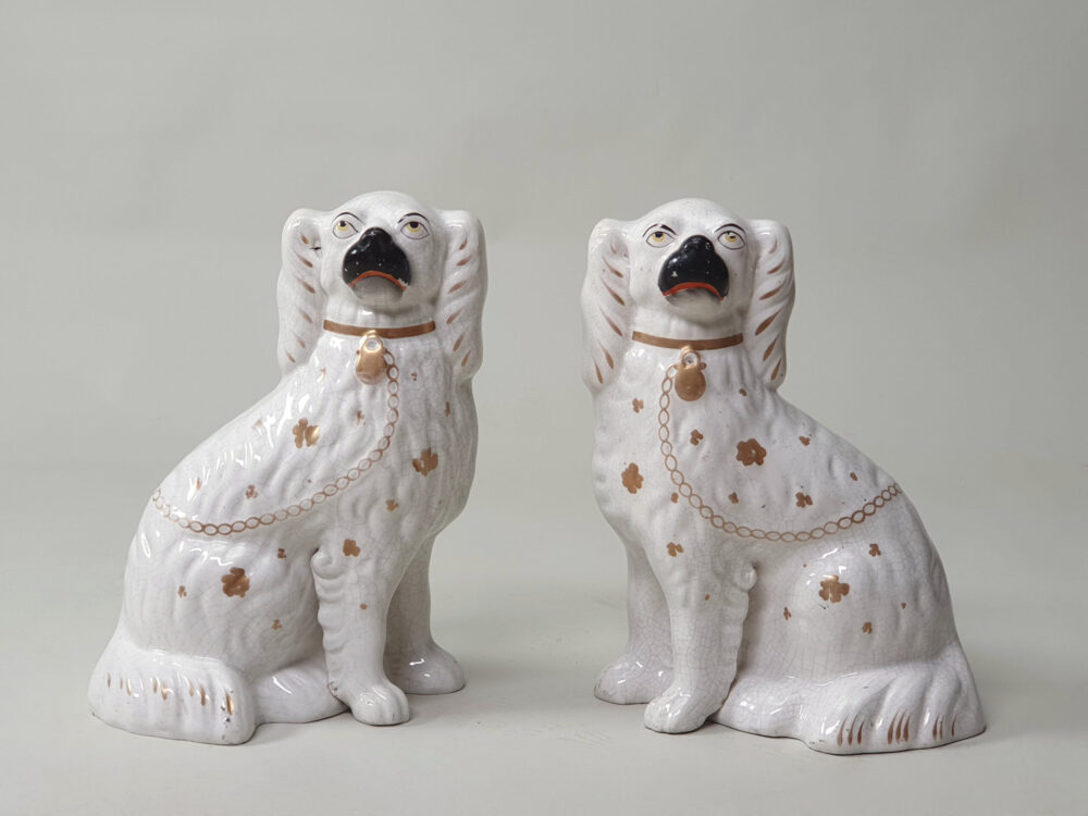 Pair of antique ceramic Victorian Staffordshire Spaniel Dogs