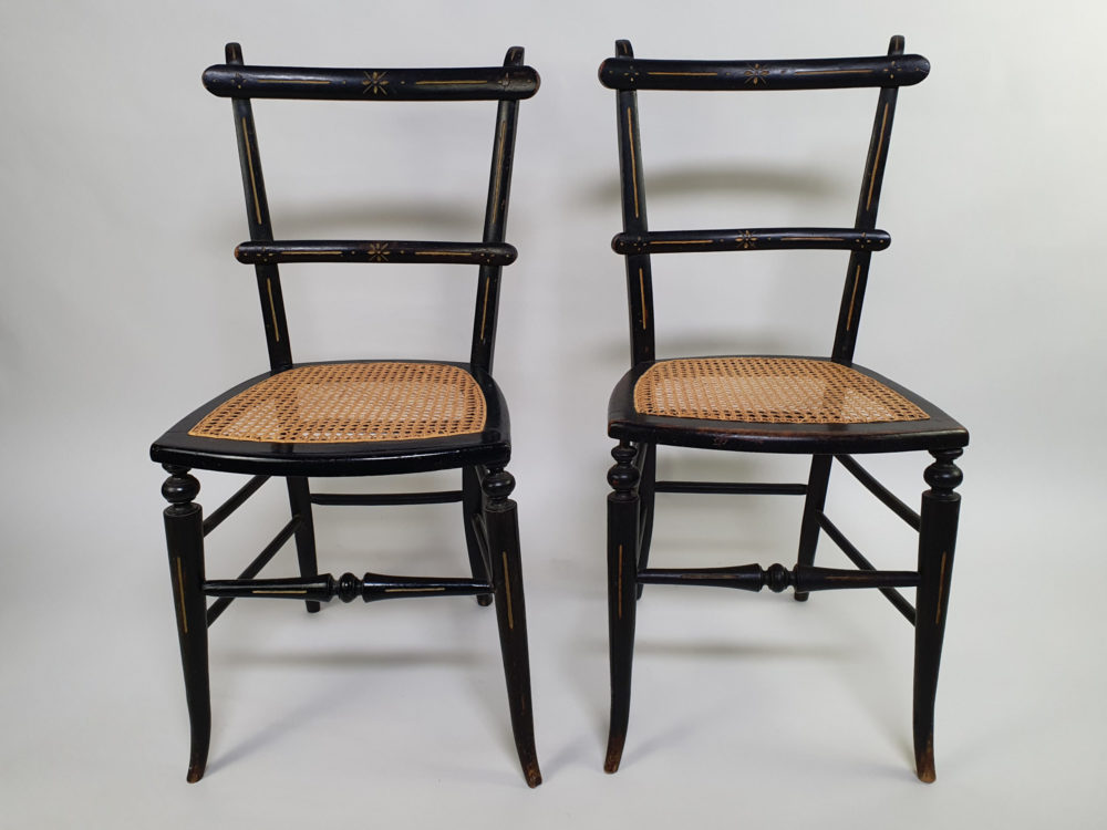 Pair of antique ebonised Aesthetic Movement caned bedroom Chairs