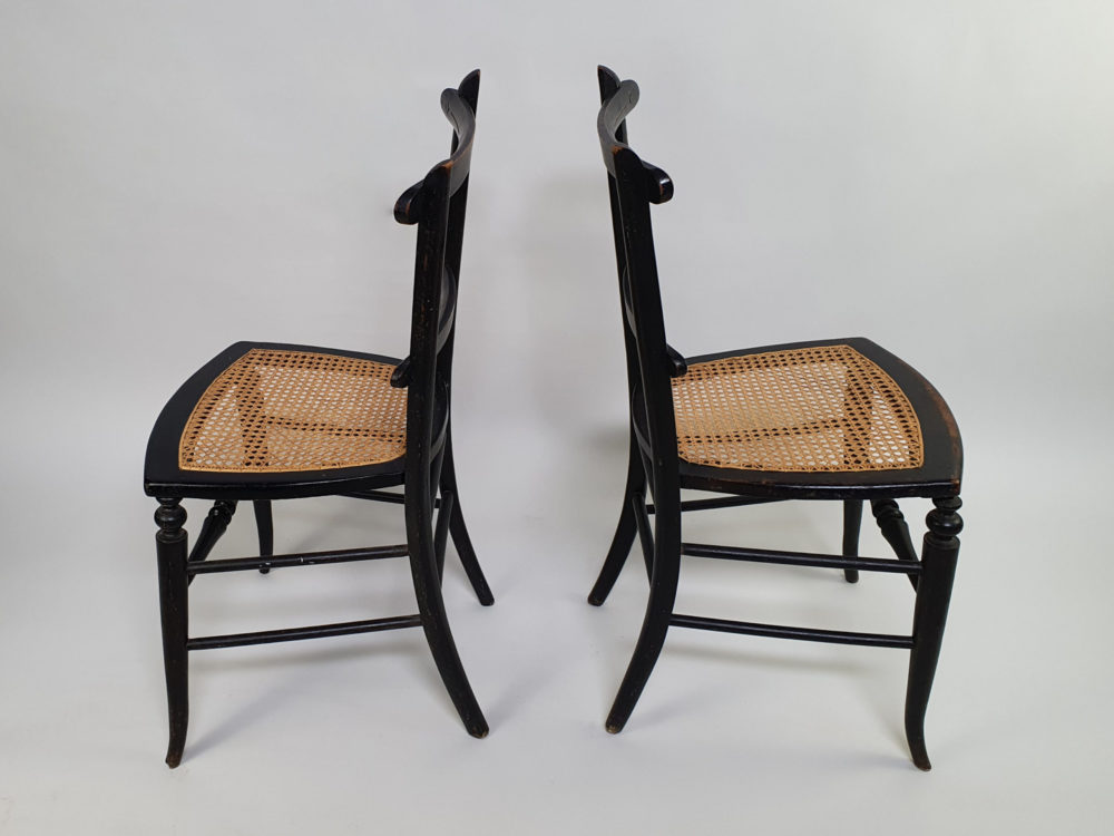 Pair of antique ebonised Aesthetic Movement caned bedroom Chairs