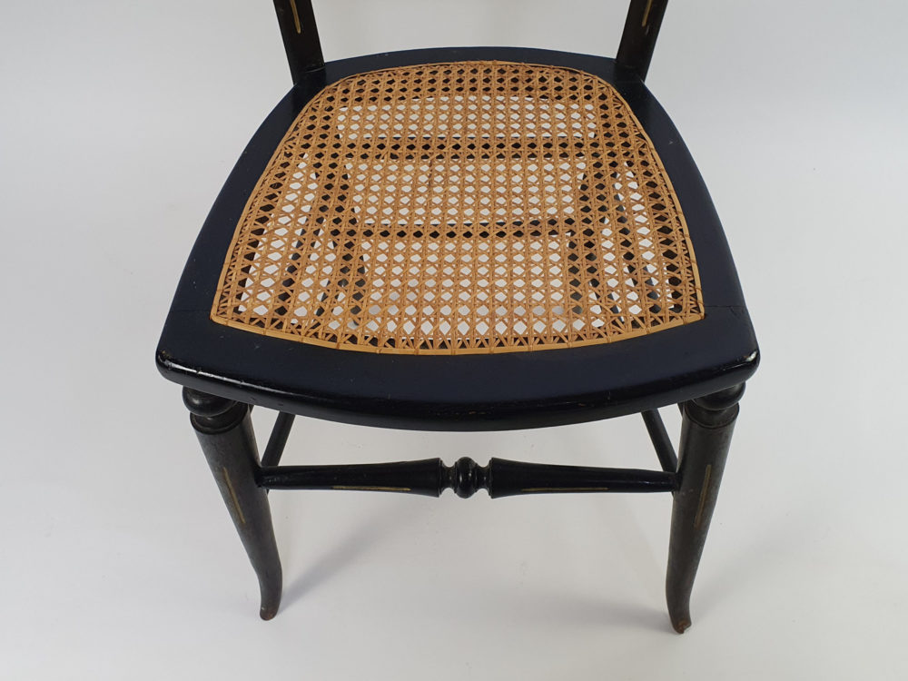 Pair of antique ebonised Aesthetic Movement caned bedroom Chairs