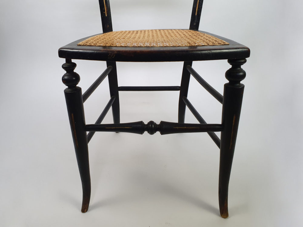 Pair of antique ebonised Aesthetic Movement caned bedroom Chairs