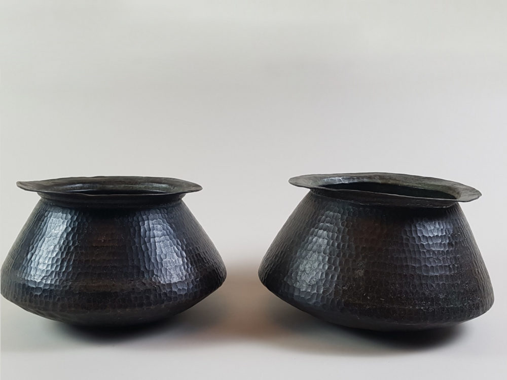 Pair of antique hand beaten copper bowls