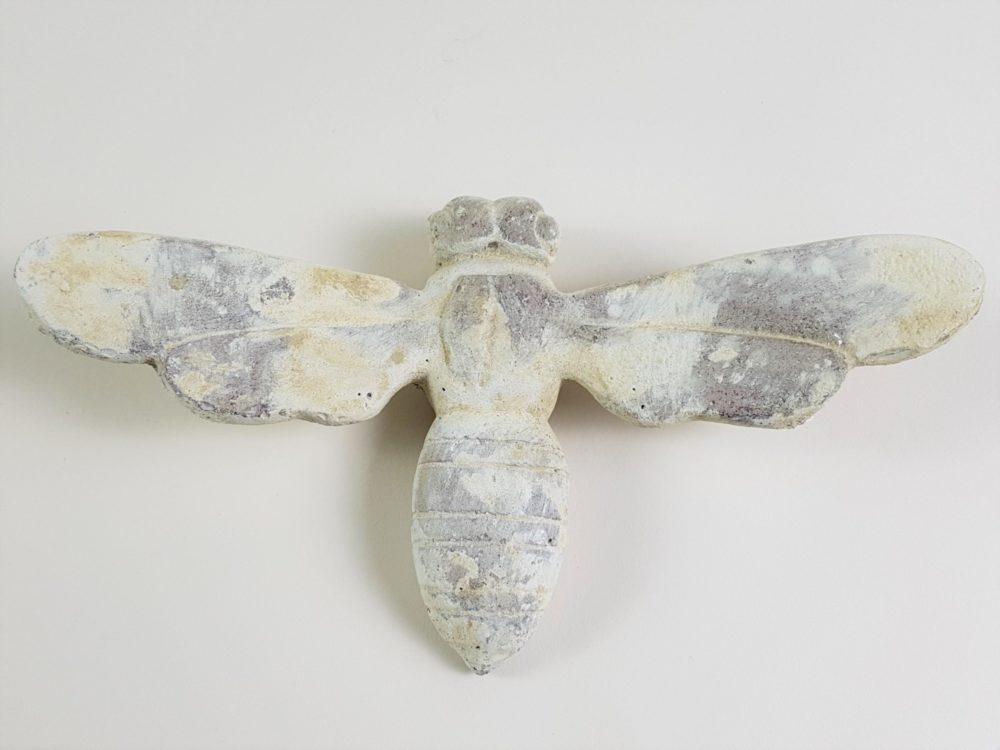 Pair of antique stone Bees from a Church building