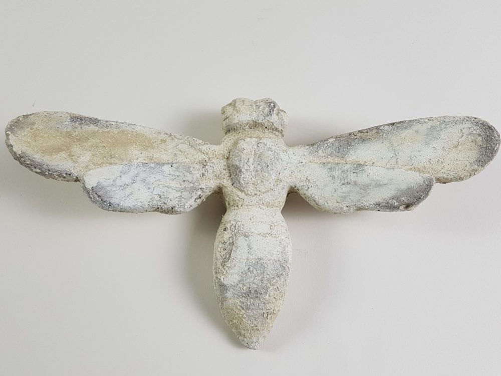 Pair of antique stone Bees from a Church building