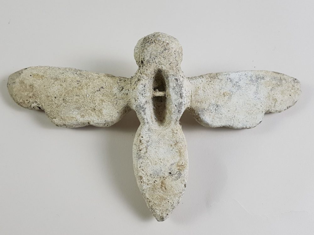 Pair of antique stone Bees from a Church building
