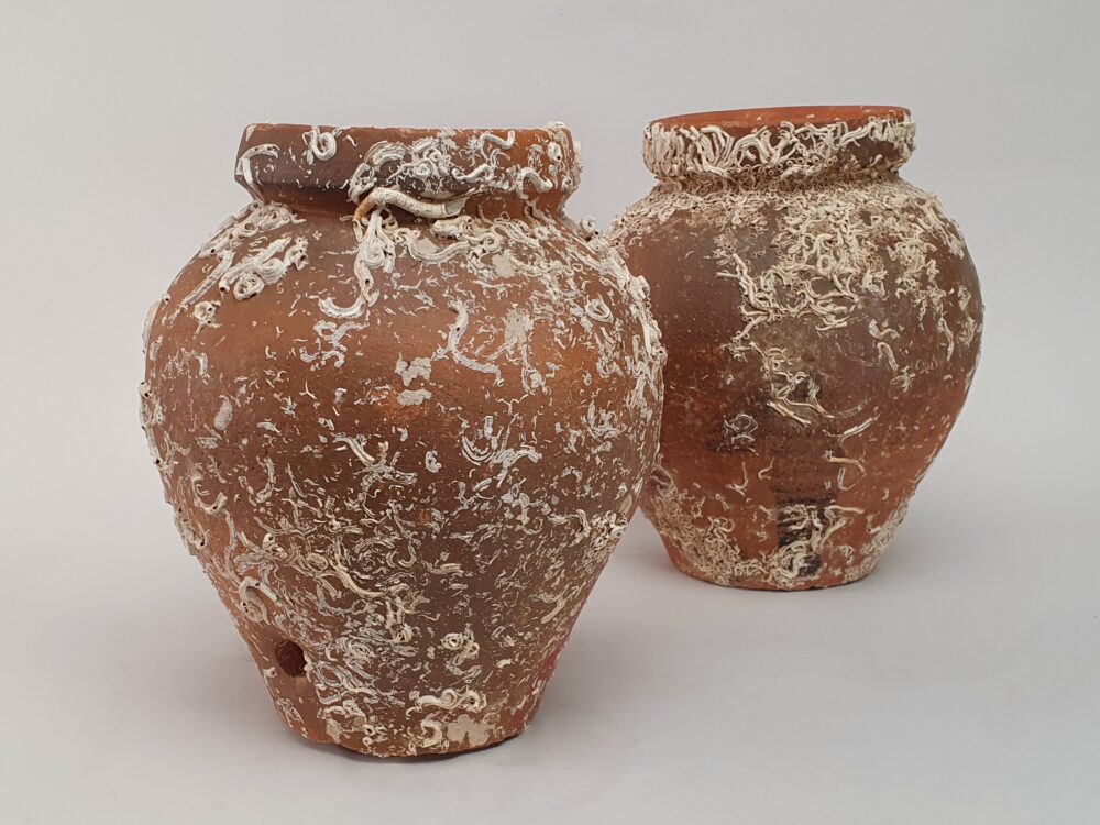 Pair of antique terracotta Octopus Traps or Pots